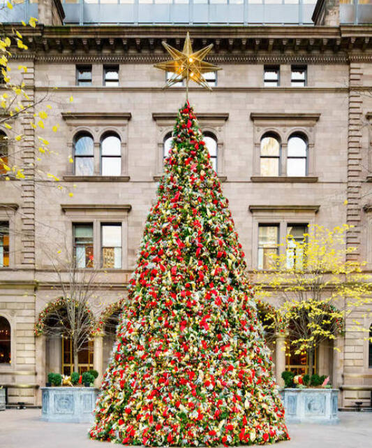 The quiet holiday Christmas tree tucked inside the historic courtyard of the Lotte New York Palace hotel.